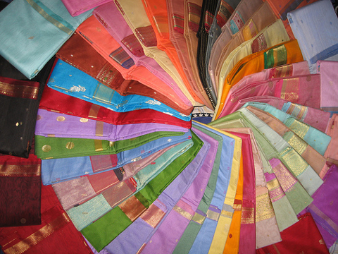 Folded saris ordered in a circle